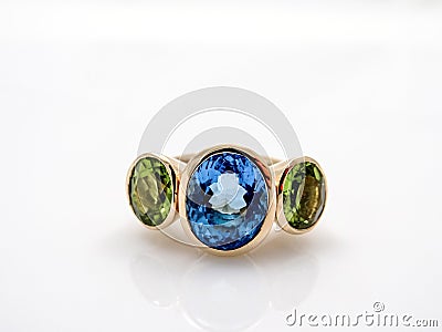 Gold womenÂ´s designer ring with three gems Stock Photo