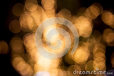 Gold or yellow bokeh texture background with glowing and illuminated, holiday and festive for celebration. Stock Photo