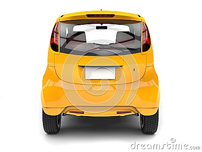Gold yellow compact car - back view Stock Photo