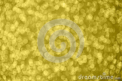 Golden abstract bokeh background. Color of the year 2021. Illuminating background. Christmas textures. Defocused shiny sequins Stock Photo