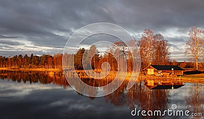 Golden autumn sunrise at lake Ã–je in Dalarna in Sweden Stock Photo