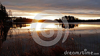 Golden autumn sunrise at lake Ã–je in Dalarna in Sweden Stock Photo