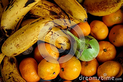Golden Banana and Orange Stock Photo