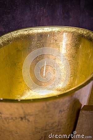 Golden bathtub Stock Photo