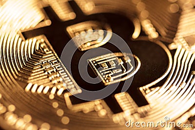 Golden bitcoin close-up Stock Photo