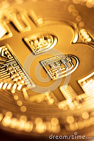 Golden bitcoin close-up Stock Photo