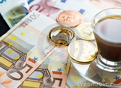 Golden Bitcoin Crypto currency coin on euro banknotes. Investments, cryptocurrency digital payment concept Stock Photo