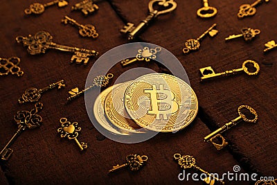 Golden BitCoin Currency Coin with Treasure Keys Stock Photo