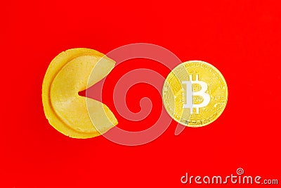 Golden bitcoin with Fortune cookie Stock Photo