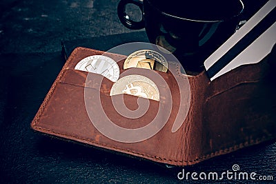 The golden bitcoin, men`s purse credit card Editorial Stock Photo