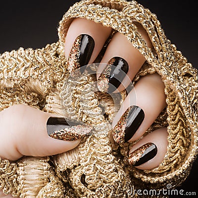 Golden black nails Stock Photo