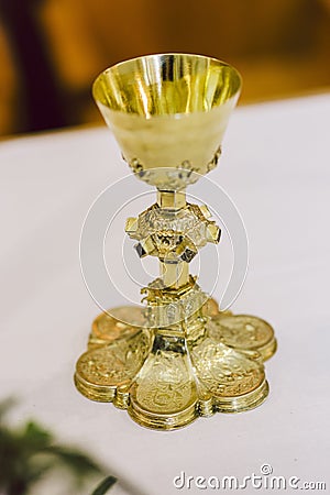 Golden blessed chalice for the Christian liturgy Stock Photo