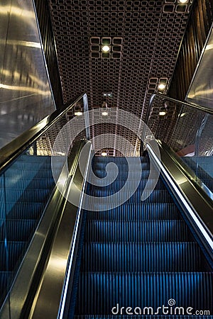 Golden blue escalator Stock Photo