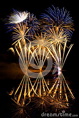 Golden and Blue Fireworks Stock Photo