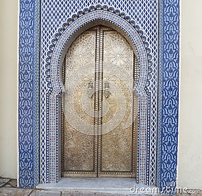 Golden and blue ornate arched doorway Stock Photo