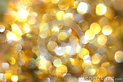 Golden blurred background bokeh yellow and white circles, glitter Stock Photo