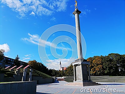 Golden boy sculpture in Siauliai Editorial Stock Photo