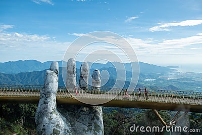 Golden bridge and big hand in Bana Hills French village Editorial Stock Photo