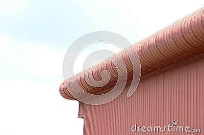Golden brown curve metal sheet building Stock Photo