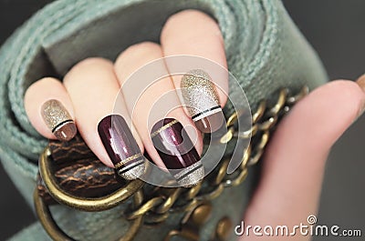 Golden brown French manicure. Stock Photo