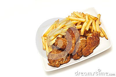 Golden brown fried chicken served with fries Stock Photo