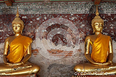 Golden Buddha images in Wat Suthat Thepphawararam the royal temple of the first grade in Bangkok. Stock Photo