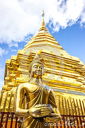 Golden Buddha and Pagoda and blue sky background Stock Photo