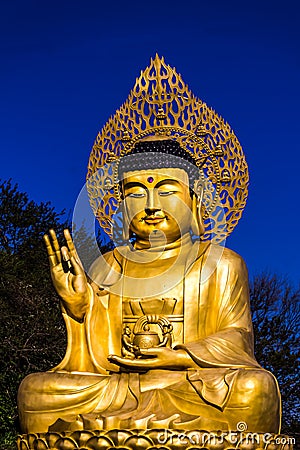 Golden Buddha statue at buddhist temple of Sanbangsan Mountain Stock Photo