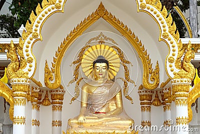 Golden buddha statue in plastic wrapped Stock Photo