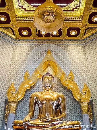 Golden Buddha statue in a temple Editorial Stock Photo