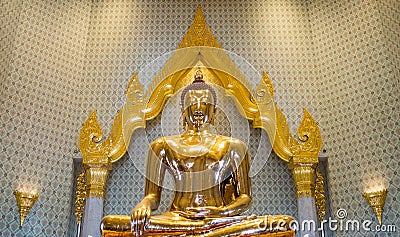 Golden Buddha statue in a temple Editorial Stock Photo
