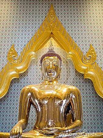 Golden Buddha statue in a temple Editorial Stock Photo