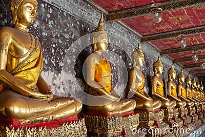 Golden Buddha statue in Wat Suthat Thepphawararam the royal temple of the first grade in Bangkok. Stock Photo