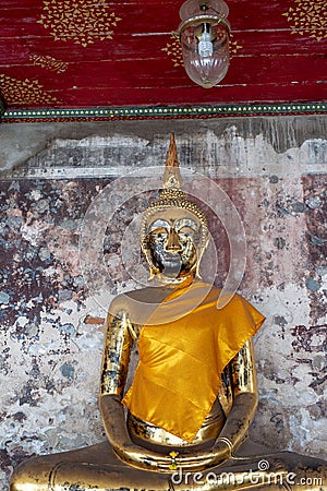 Golden Buddha statue in Wat Suthat Thepphawararam the royal temple of the first grade in Bangkok. Stock Photo