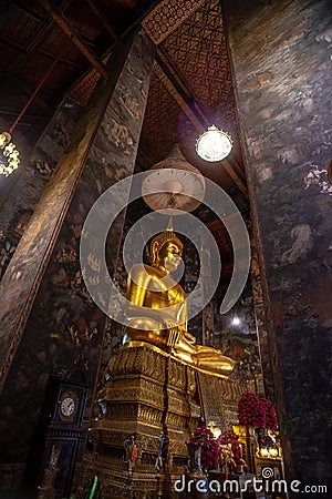 Golden Buddha statue in Wat Suthat Thepphawararam the royal temple of the first grade in Bangkok. Stock Photo