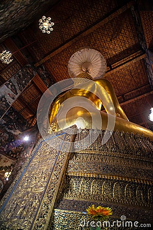 Golden Buddha statue in Wat Suthat Thepphawararam the royal temple of the first grade in Bangkok. Stock Photo