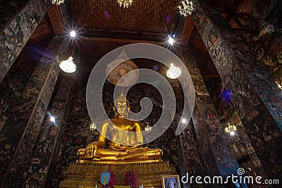Golden Buddha statue in Wat Suthat Thepphawararam the royal temple of the first grade in Bangkok. Stock Photo