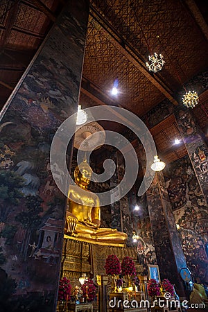Golden Buddha statue in Wat Suthat Thepphawararam the royal temple of the first grade in Bangkok. Stock Photo