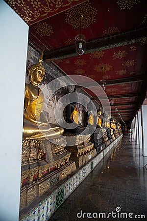 Golden Buddha statue in Wat Suthat Thepphawararam the royal temple of the first grade in Bangkok. Stock Photo