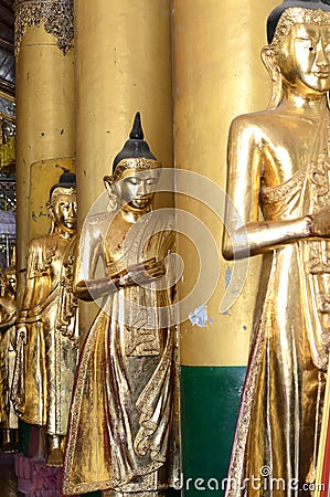 Golden Buddha Statues in the Temple Editorial Stock Photo