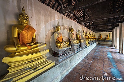 row of golden buddha in Bangkok, thailand . Stock Photo