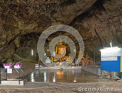 Golden buddha in Tham kra Sae Temple cave in Kanchanaburi province, Thailand near the bridge railway station. Famous tourist Editorial Stock Photo