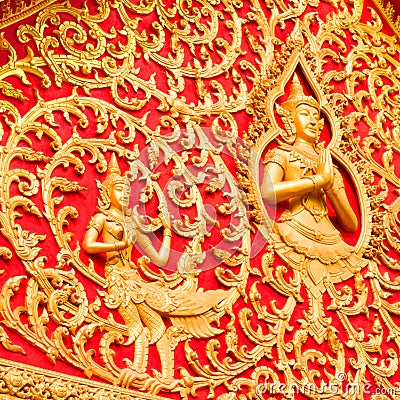 Golden budha on red background Stock Photo