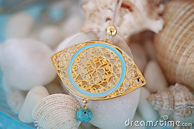 Golden byzantine necklace with turquoise semi precious stone Stock Photo