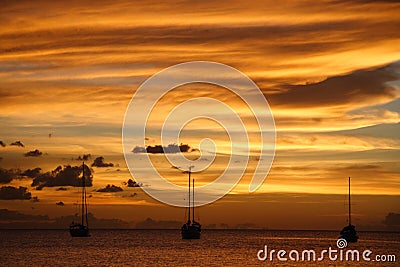 Golden Caribbean Sunset Cruise Stock Photo