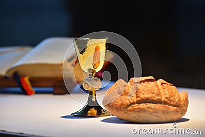 Golden chalice, bread. Stock Photo