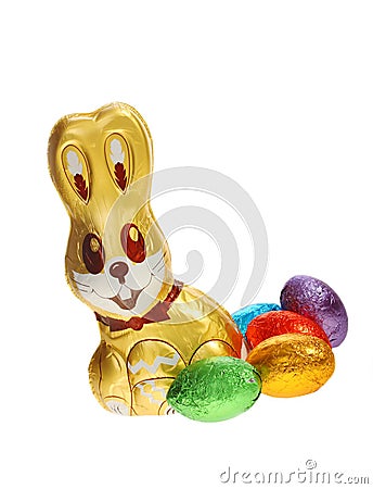 Golden chocolate Easter bunny with eggs Stock Photo