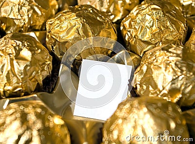 Golden chocolates space. Stock Photo