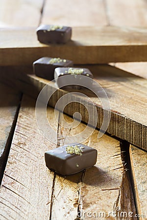 Golden chocolates Stock Photo