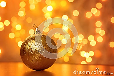 Golden christmas ball with garland Stock Photo
